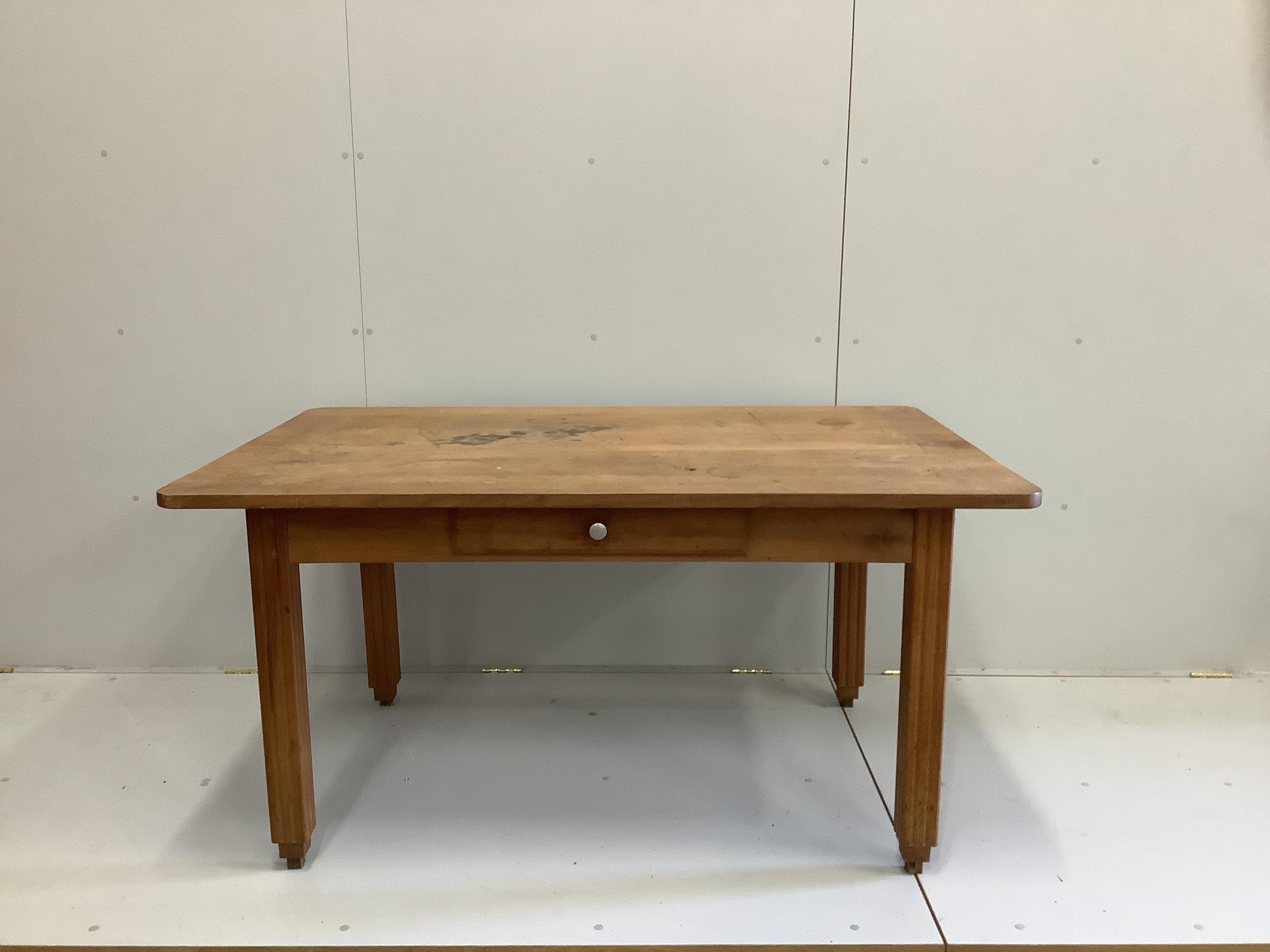 An early 20th century French fruitwood kitchen table with one drawer, width 149cm, depth 95cm, height 74cm